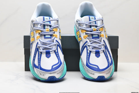 New Balance M1906 series athletic shoes, men's and women's shoes, breathable and lightweight, chunky sneaker style.