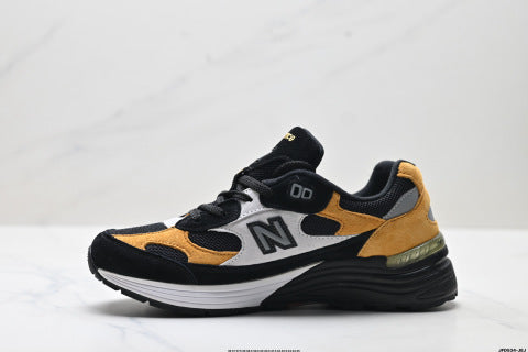 New Balance 992 series running shoes: classic retro style, versatile for casual and athletic wear.