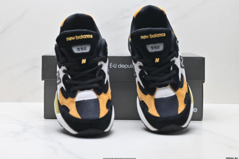 New Balance 992 series running shoes: classic retro style, versatile for casual and athletic wear.