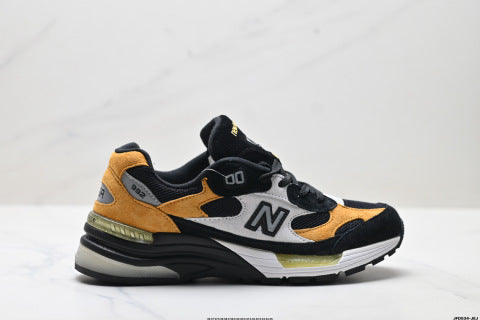 New Balance 992 series running shoes: classic retro style, versatile for casual and athletic wear.