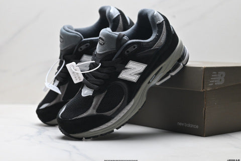 New Balance 2002R athletic shoes, men's and women's, breathable and cushioned, outdoor style.