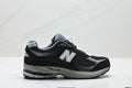 New Balance 2002R athletic shoes, men's and women's, breathable and cushioned, outdoor style.