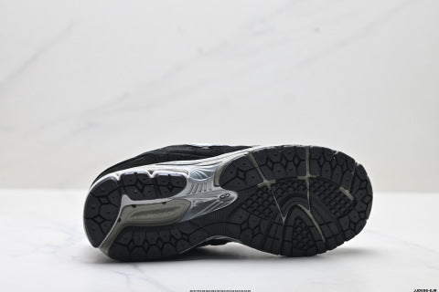 New Balance 2002R athletic shoes, men's and women's, breathable and cushioned, outdoor style.
